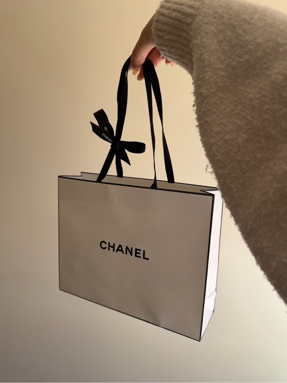 CHANEL White Shopping Bag with Black Ribbon Handles